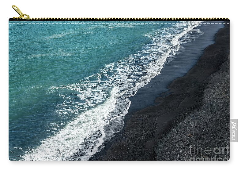 Black Zip Pouch featuring the photograph Black beach abstract by Delphimages Photo Creations