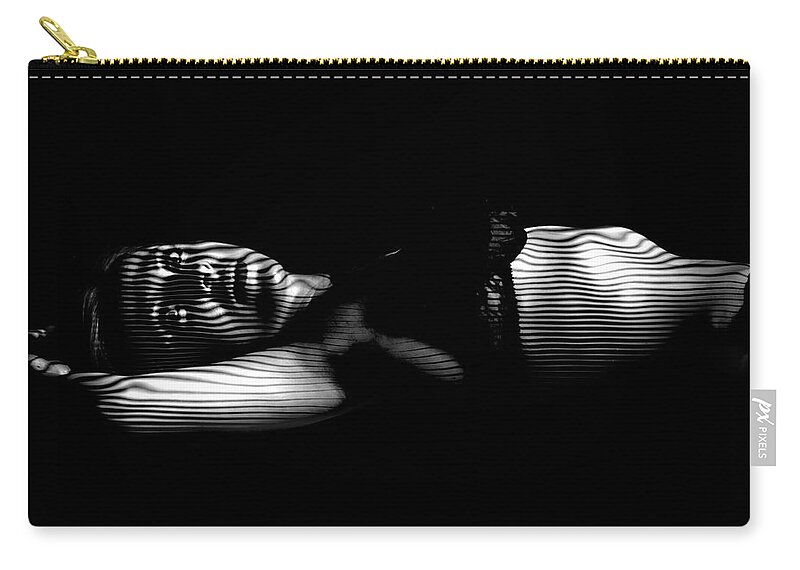 At Night Zip Pouch featuring the photograph At Night by Agustin Uzarraga