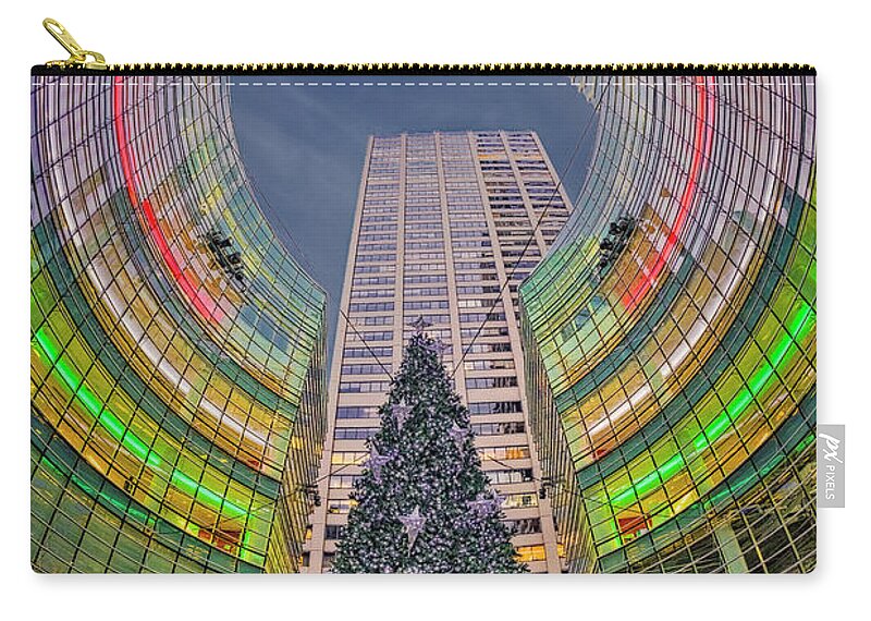 New York City Zip Pouch featuring the photograph Bloomberg Tower NYC Christmas Tree by Susan Candelario