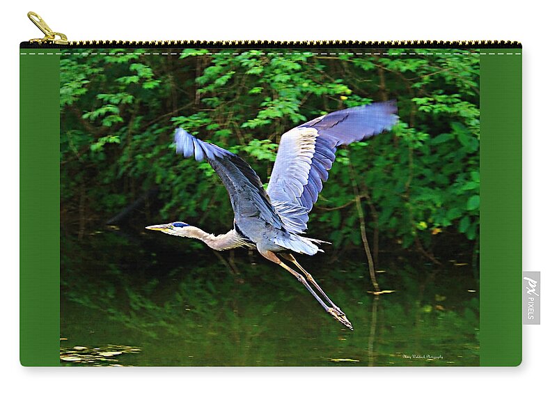 Blue Heron Zip Pouch featuring the photograph Blue Heron in Flight by Mary Walchuck