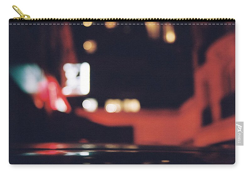 Night Zip Pouch featuring the photograph Blurry night by Barthelemy De Mazenod