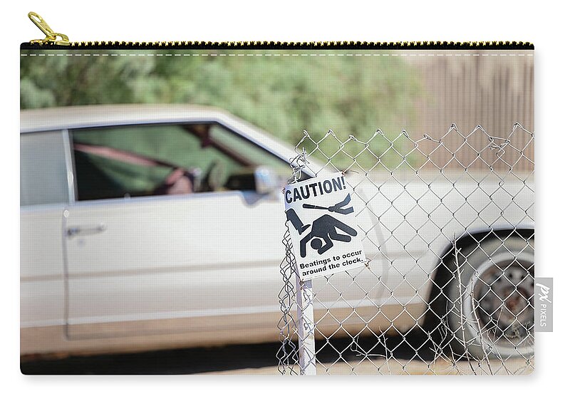 Bombay Beach Zip Pouch featuring the photograph Bombay Beatings by Chris Casas