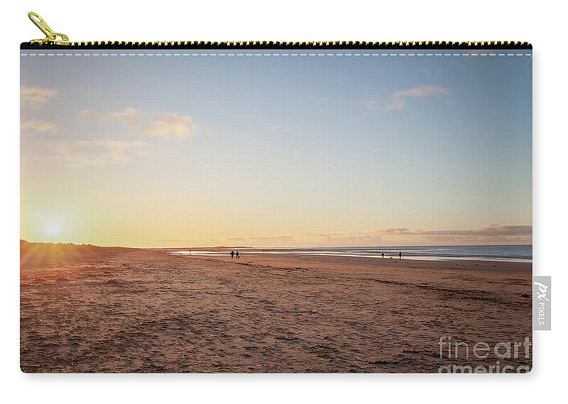 Brancaster Zip Pouch featuring the photograph Brancaster Beach North Norfolk at sunset by Simon Bratt