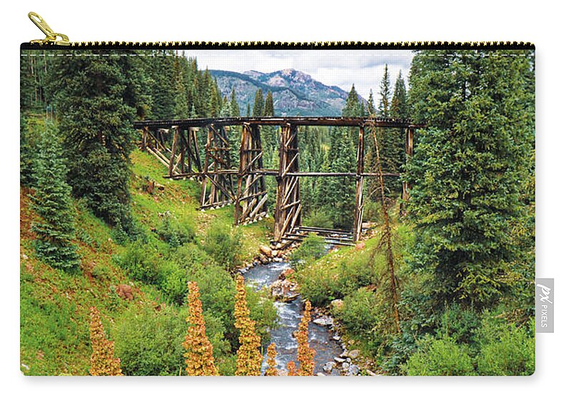 Mountain Zip Pouch featuring the photograph Bridge down a Backroad by Go and Flow Photos