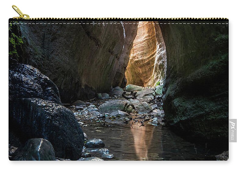 Canyon Zip Pouch featuring the photograph Bright light through the rocks by Michalakis Ppalis