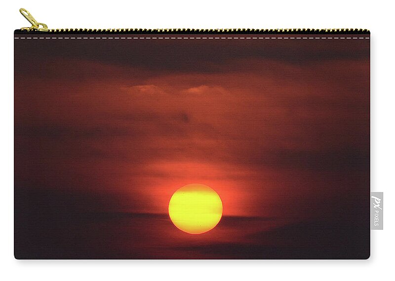 Sunset Zip Pouch featuring the photograph Orb Burning, Sunset in Coastal North Carolina, Photograph, Print by Eric Abernethy