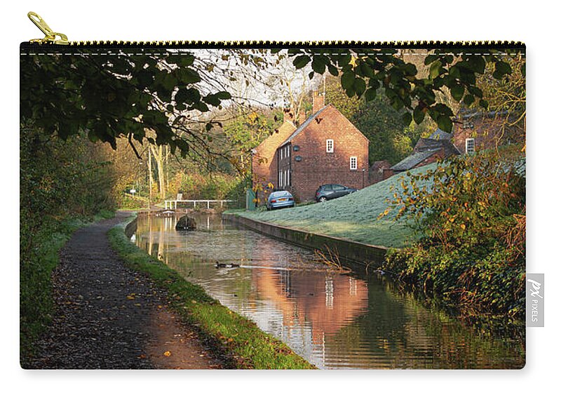 Canal Zip Pouch featuring the photograph Canal under the trees by Average Images