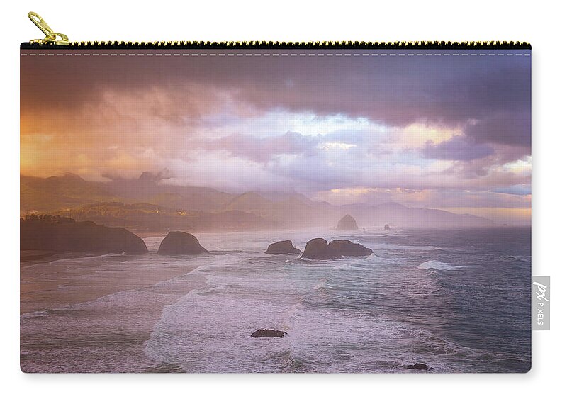 Cannon Beach Zip Pouch featuring the photograph Cannon Beach Sunrise Storm by Darren White
