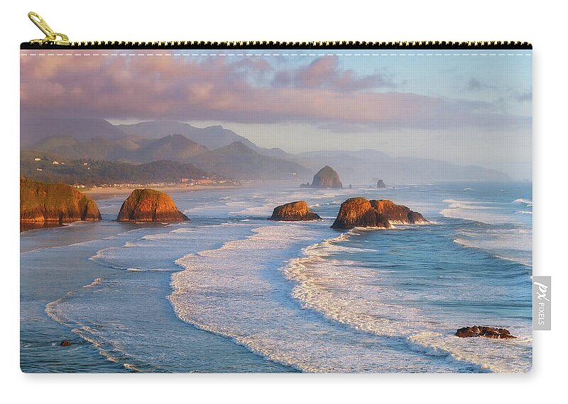 Cannon Beach Zip Pouch featuring the photograph Cannon Beach Sunset by Darren White