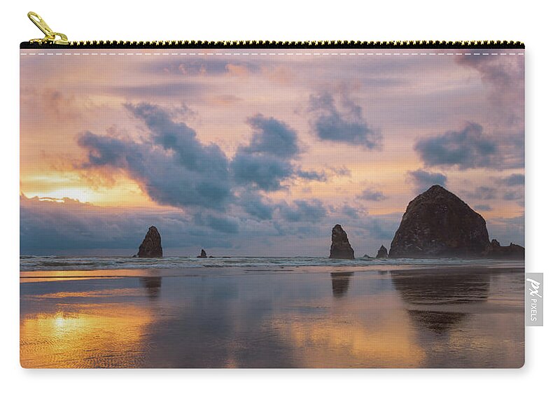 Haystack Rock Zip Pouch featuring the photograph Cannon Beach Sunset by Kevin Schwalbe