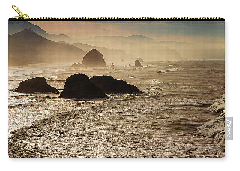 Landscapes Zip Pouch featuring the photograph Cannon Beach Morning Mist by Claude Dalley