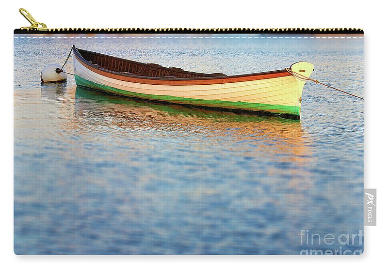 Canoe Zip Pouch featuring the photograph Canoe in harbor 1 by Tony Cordoza