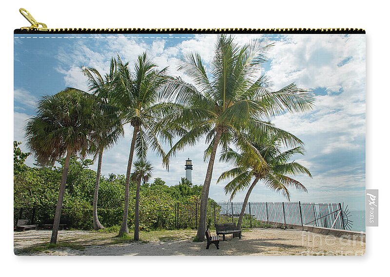 Cape Zip Pouch featuring the photograph Cape Florida Lighthouse and Palm Trees on Key Biscayne by Beachtown Views