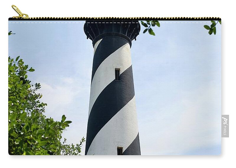 Outer Banks Zip Pouch featuring the photograph Cape Hatteras Lighthouse by Linda Mishler