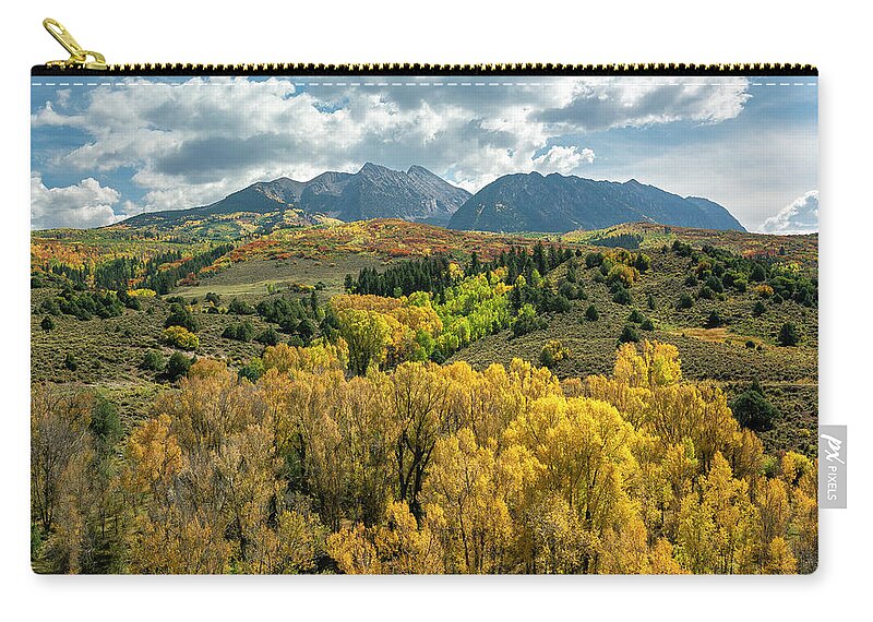Colorado Zip Pouch featuring the photograph Chair Mountain Autumn by Aaron Spong