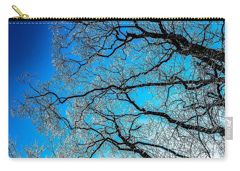 Abstract Zip Pouch featuring the photograph Chaotic System Of Ice Covered Tree Branches With Blue Sky by Andreas Berthold