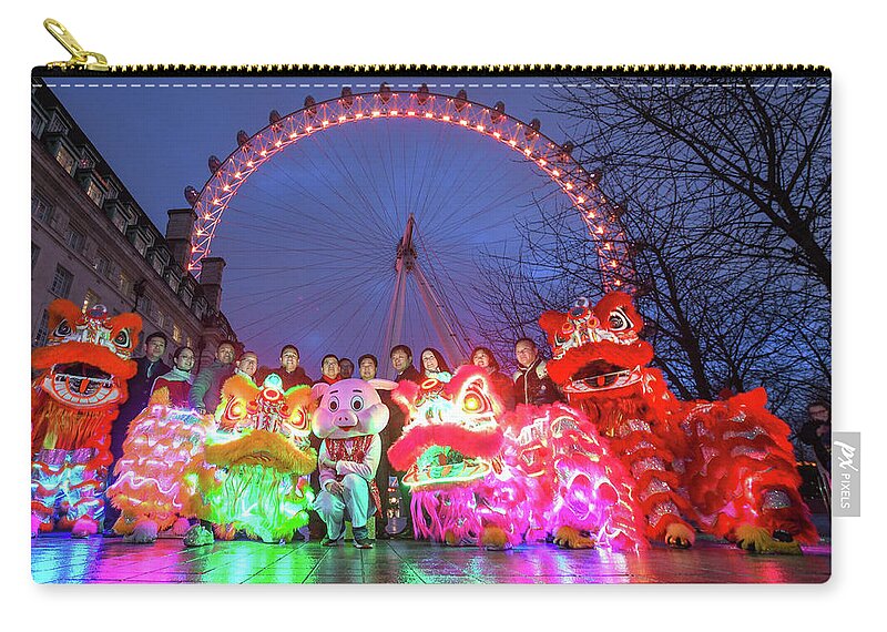 Chinese Zip Pouch featuring the photograph Chinese New Year 2019 by Andrew Lalchan