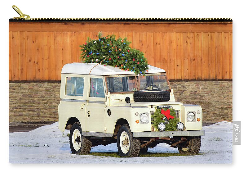 Land Rover Carry-all Pouch featuring the photograph Christmas Land Rover by Nicole Lloyd