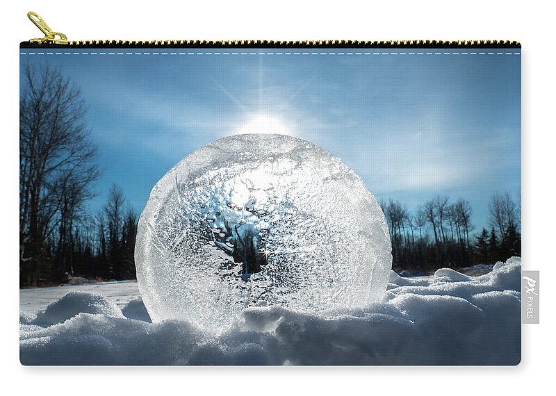Frozen Water Zip Pouch featuring the photograph Circle of Frozen Water by Sandra J's