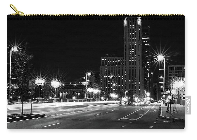 City Streets Of Columbus At Night Zip Pouch featuring the photograph City Streets Of Columbus At Night by Dan Sproul