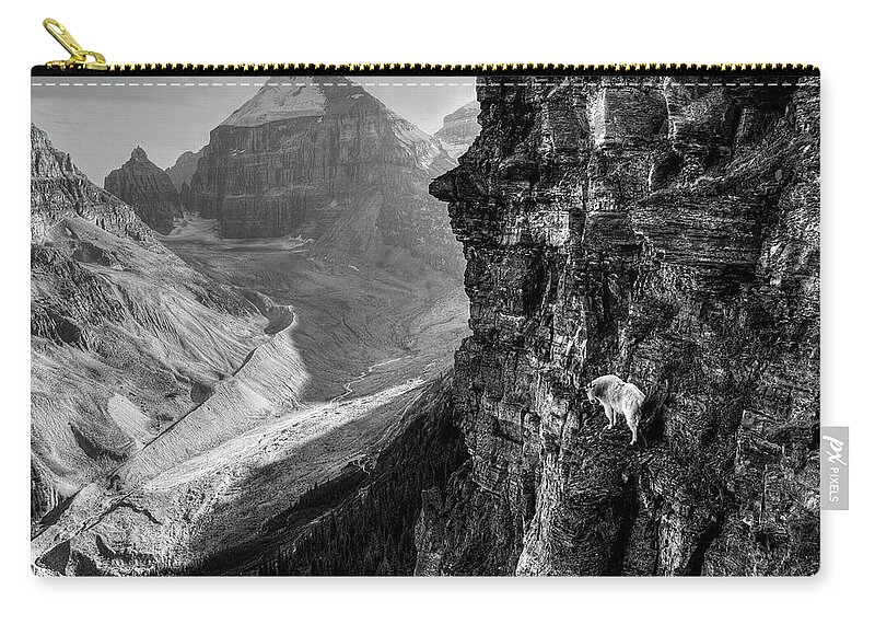 Black And White Zip Pouch featuring the photograph Cliff Walker by James Anderson