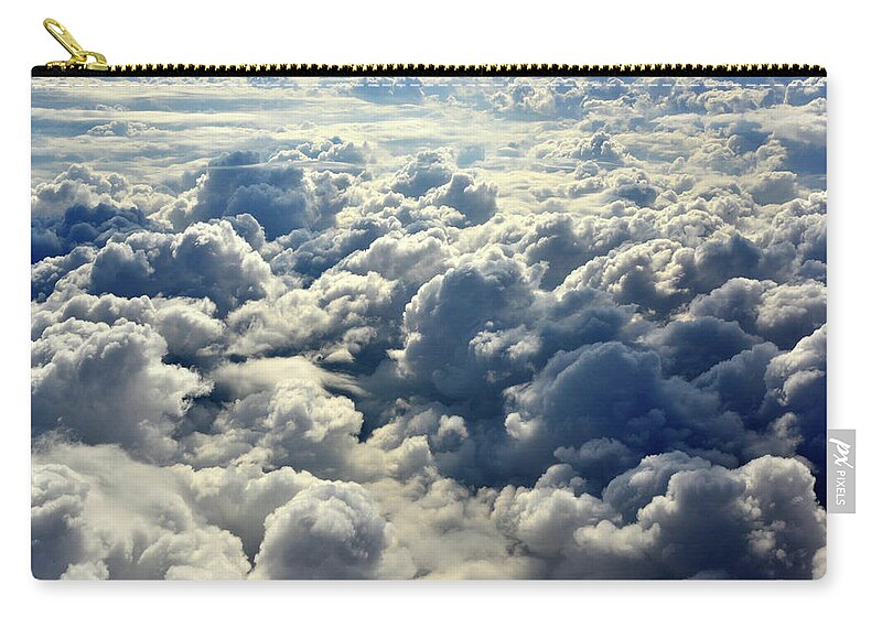 Cloud Zip Pouch featuring the photograph Clouds by Chris Smith