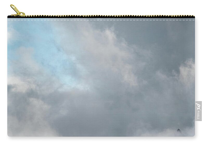 Italian Alps Zip Pouch featuring the photograph Cloudy landscape with edge of rocky mountains between the stormy sky by Michalakis Ppalis