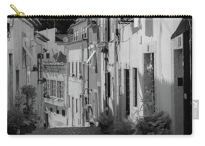Balcony Zip Pouch featuring the photograph Cobblestone Streets of Lisbon's Old Quarter by Christina McGoran
