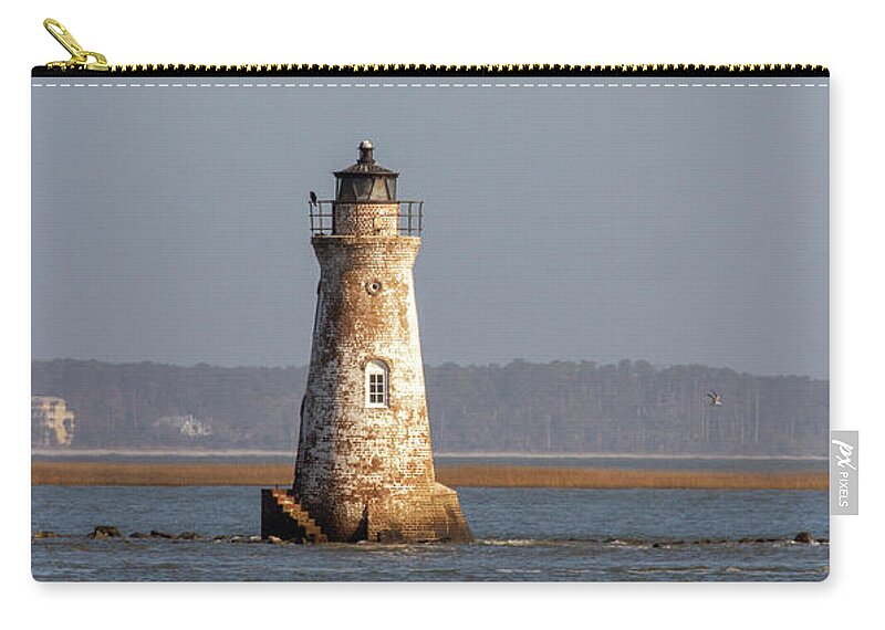 America Zip Pouch featuring the photograph Cockspur Island Lighthouse and breakwater by Karen Foley