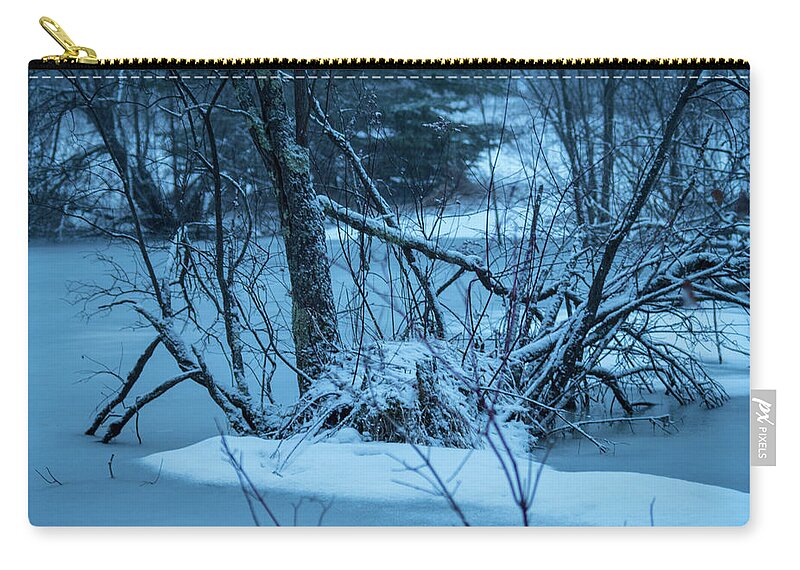 Snow Zip Pouch featuring the photograph Cold and dark in the swamp by Nathan Wasylewski