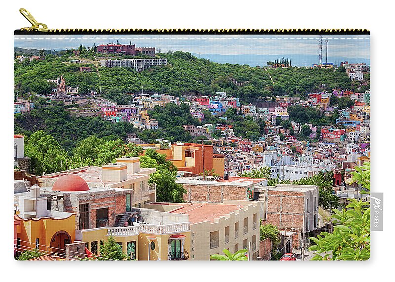 Guanajuato Zip Pouch featuring the photograph Colorful hilltop houses in Guanajuato, Mexico 2 by Tatiana Travelways