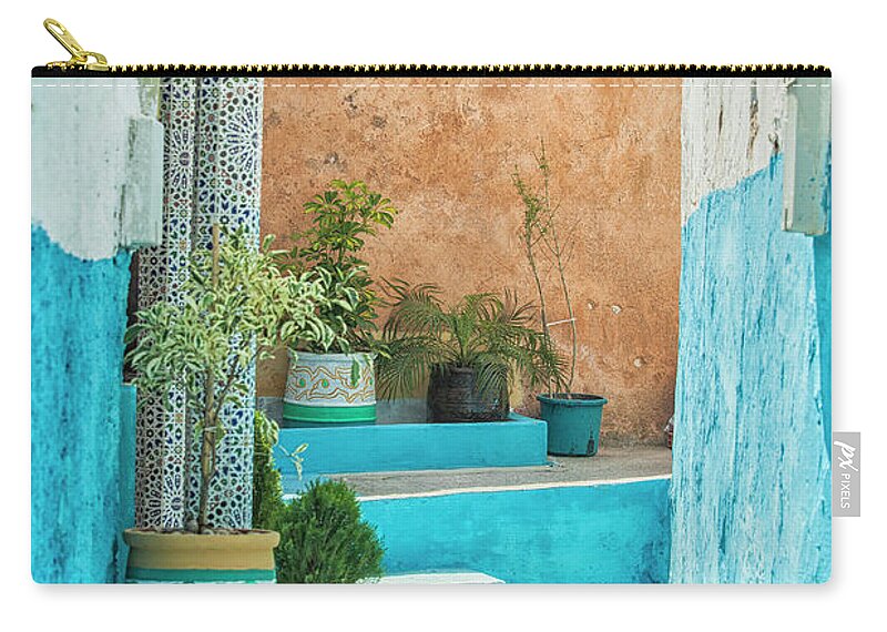 Morocco Zip Pouch featuring the photograph Colorful street by Patricia Hofmeester