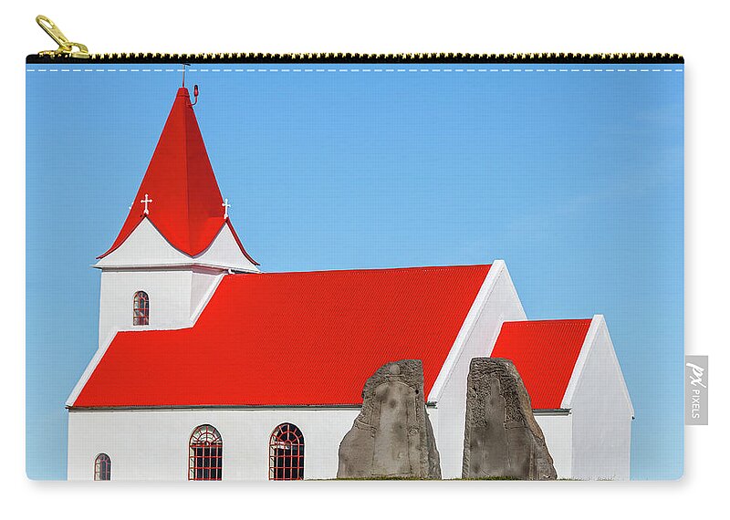 Iceland Zip Pouch featuring the photograph Concrete Church of Iceland by David Letts