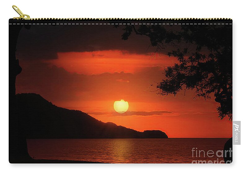 Sunset Zip Pouch featuring the photograph CostaRicaSunset by Ed Taylor