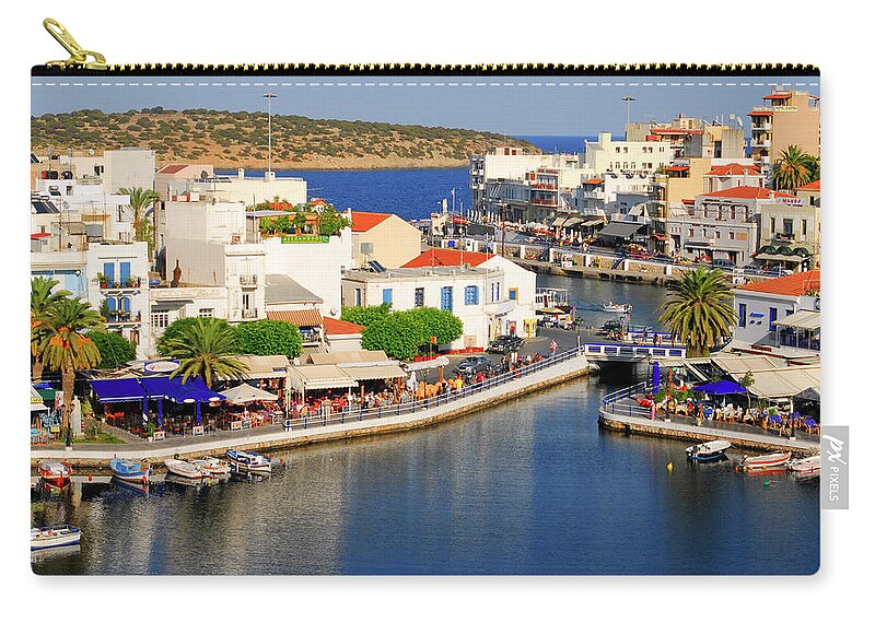 Greece Zip Pouch featuring the photograph Crete island, Greece, Agios Nicolaos town by Severija Kirilovaite