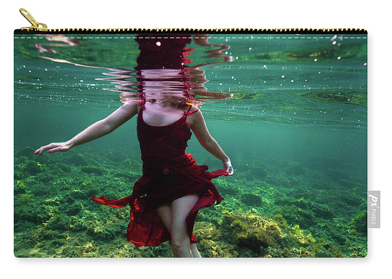 Swim Zip Pouch featuring the photograph Dancing on her own by Gemma Silvestre