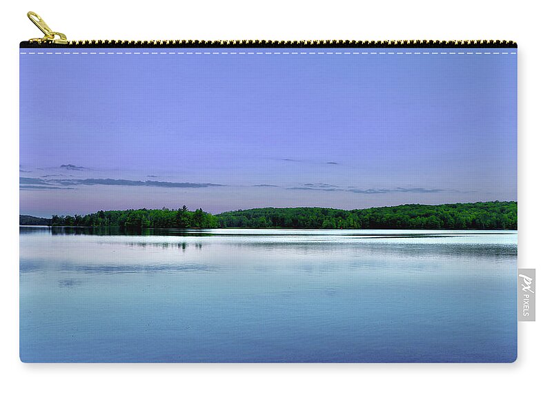 Dawn Zip Pouch featuring the photograph Dawn on Nelson Lake by Sarah Lilja