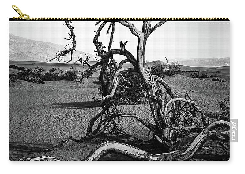 B&w Zip Pouch featuring the photograph Dead Tree On The Dunes by Mike Schaffner
