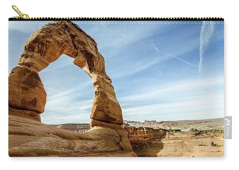 Desert Zip Pouch featuring the photograph Delicate Arch No.2 by Margaret Pitcher