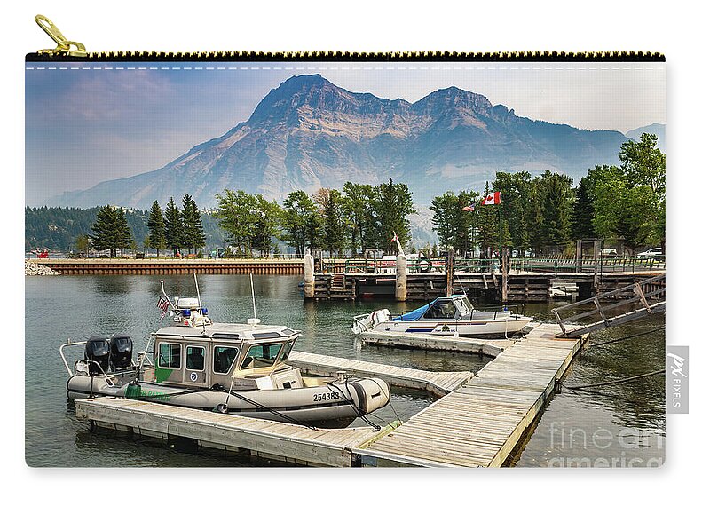 Waterton Lake Zip Pouch featuring the photograph Dock at Warterton Lake with Boats by Roslyn Wilkins