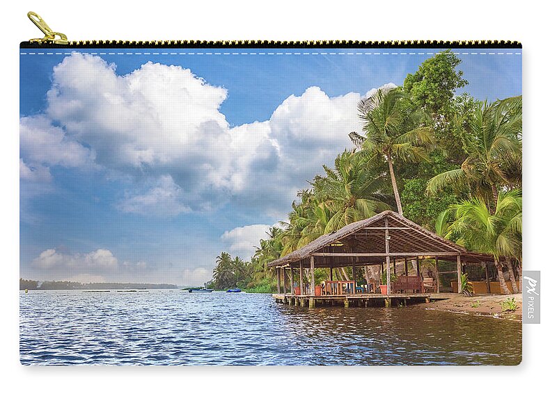 African Zip Pouch featuring the photograph Dockhouse Under the Palms by Debra and Dave Vanderlaan