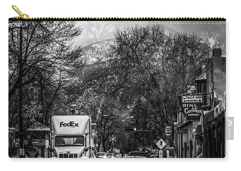 Taos Zip Pouch featuring the photograph Downtown Taos by Elijah Rael