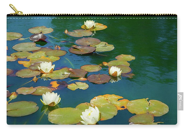 Water Lily Carry-all Pouch featuring the photograph Dreamy Water Lilies on Pond by Bonnie Follett