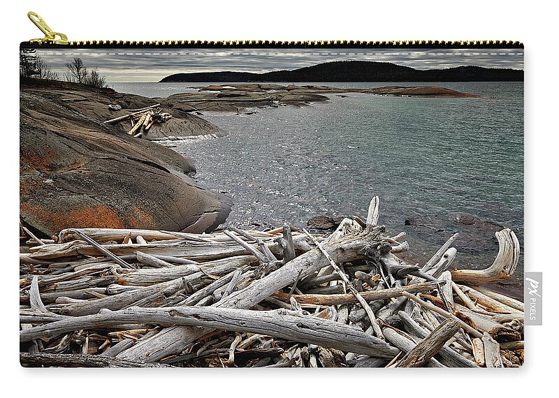 Coast Zip Pouch featuring the photograph Driftwood Dilemma by Doug Gibbons