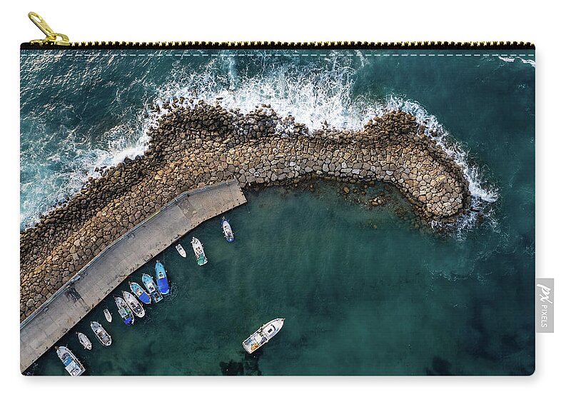 Fishing Harbor Carry-all Pouch featuring the photograph Drone aerial fishing harbour with boats stormy waves, blue sea by Michalakis Ppalis