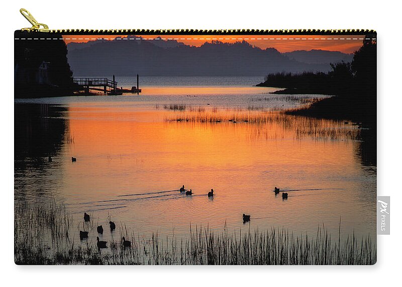 Ducks Zip Pouch featuring the photograph Ducks at sunrise, San Pablo Bay by Donald Kinney