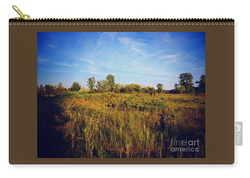 Nature Zip Pouch featuring the photograph Early Autunm Sun On The Prairie by Frank J Casella