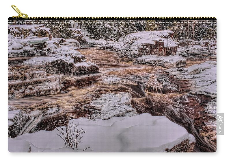 Eau Claire Dells Zip Pouch featuring the photograph Eau Claire River Flow Through The Snow by Dale Kauzlaric
