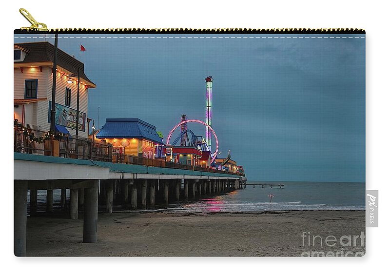 Stormy Zip Pouch featuring the photograph Evening Lights on the Pleasure Pier by Diana Mary Sharpton