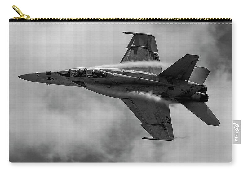 Airplane Zip Pouch featuring the photograph F18 in Black and White by Carolyn Hutchins